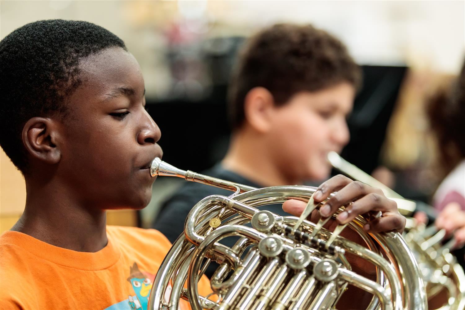 Students playing French Horn